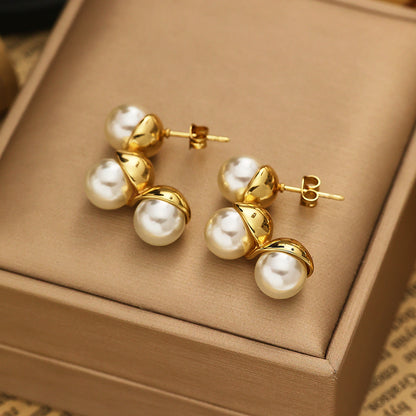 316L stainless steel stud earrings with three beads, which look like a peanut.